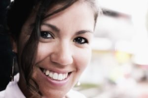 Mariana from Brazil, standing in a rainy day in a street corner in Neutral Bay, Sydney, Australia